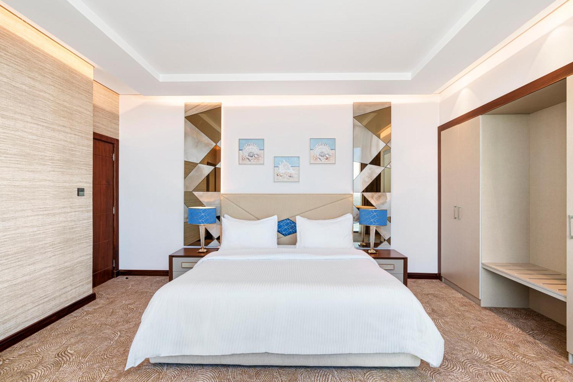 Rixos Premium Alamein El Alamein Chambre photo A bedroom at the hotel