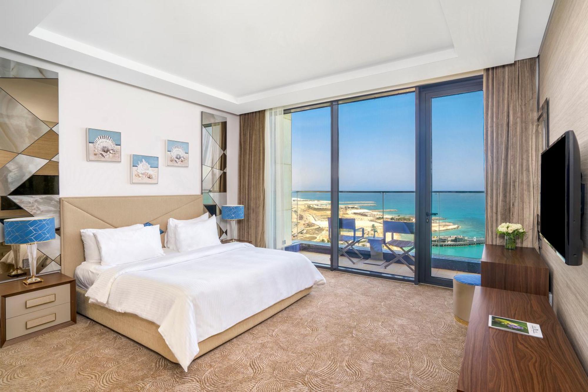 Rixos Premium Alamein El Alamein Chambre photo A bedroom at the hotel