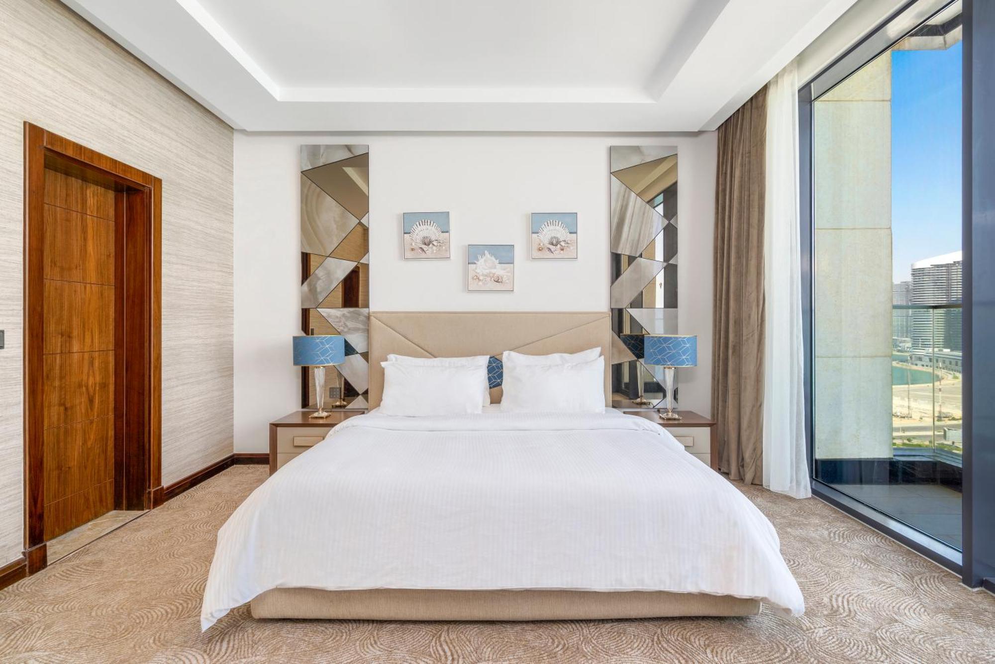Rixos Premium Alamein El Alamein Chambre photo A bedroom at the hotel