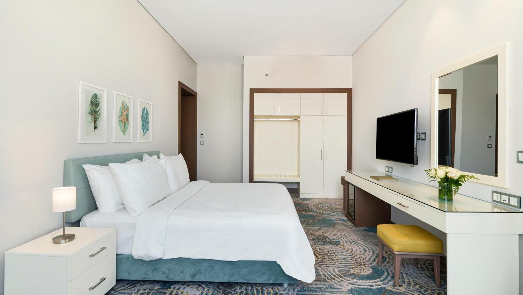 Rixos Premium Alamein El Alamein Chambre photo A bedroom at the hotel